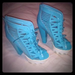 heels. Zips up the back tie in front